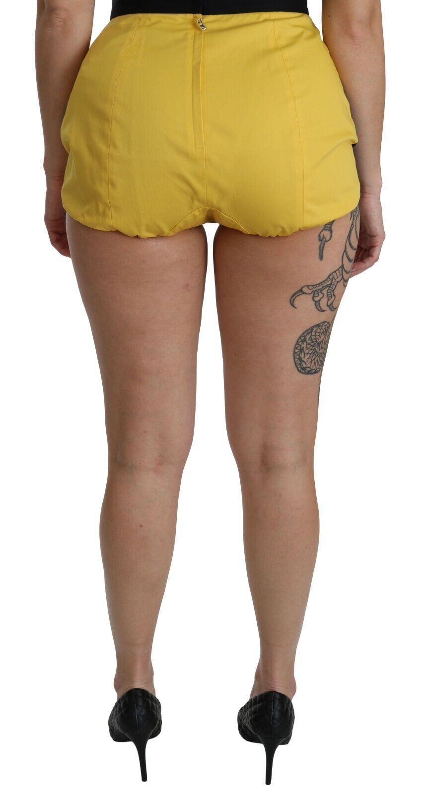 Shorts corti in cotone giallo e nero con gioielli Dolce & Gabbana
