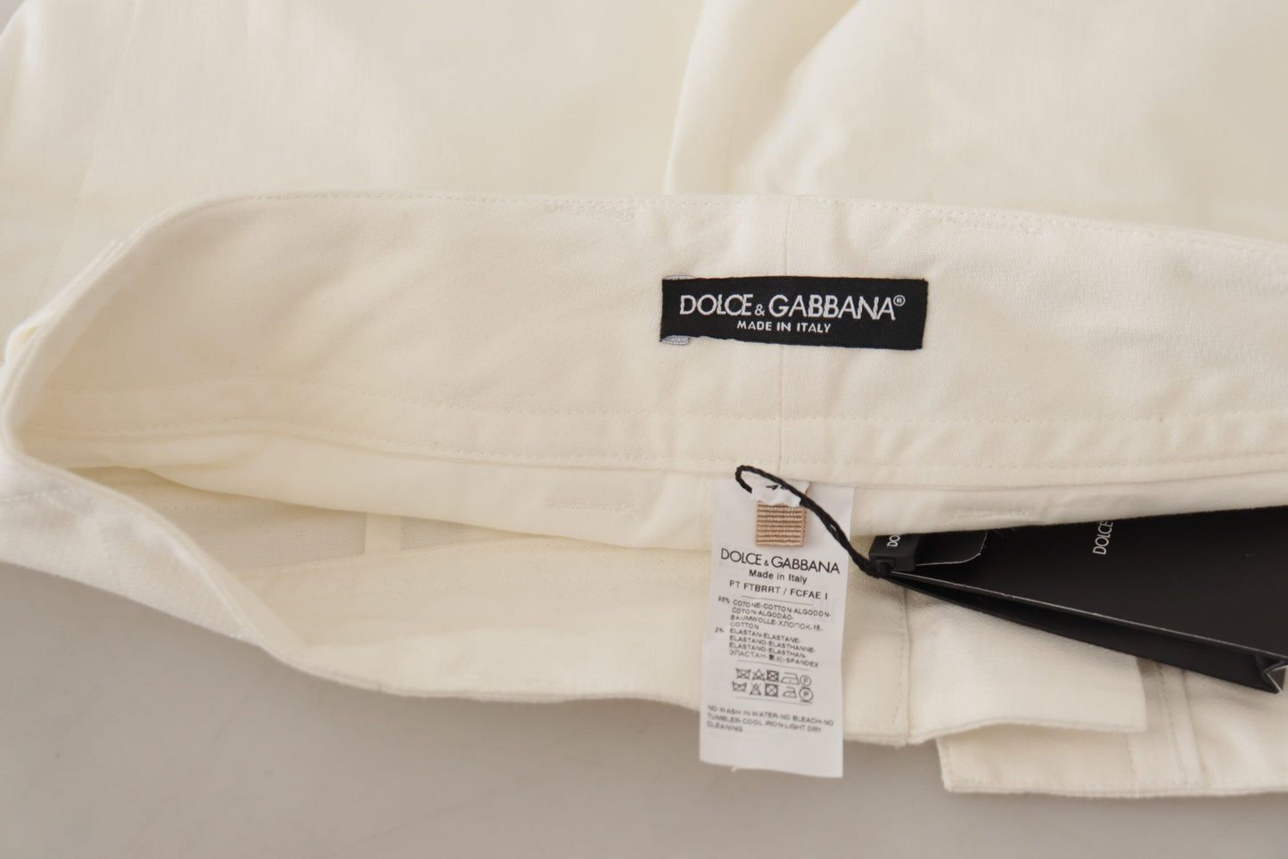 Pantaloni da donna in cotone affusolati a vita alta bianchi Dolce & Gabbana