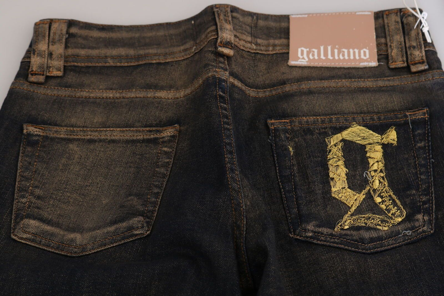 Pantaloni in denim svasati a vita media in cotone nero lavato John Galliano