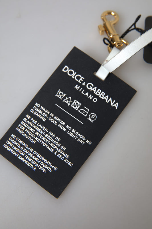 Portachiavi in ottone dorato con logo DG in silicone nero Dolce & Gabbana