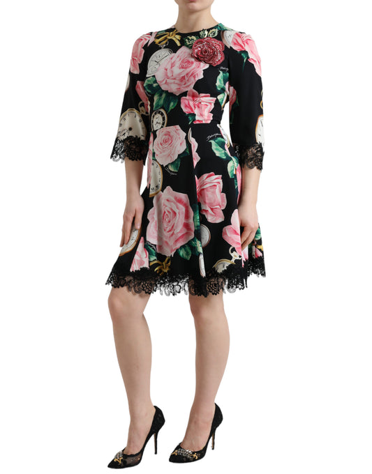 Abito a trapezio in pizzo nero con decorazioni floreali di Dolce & Gabbana