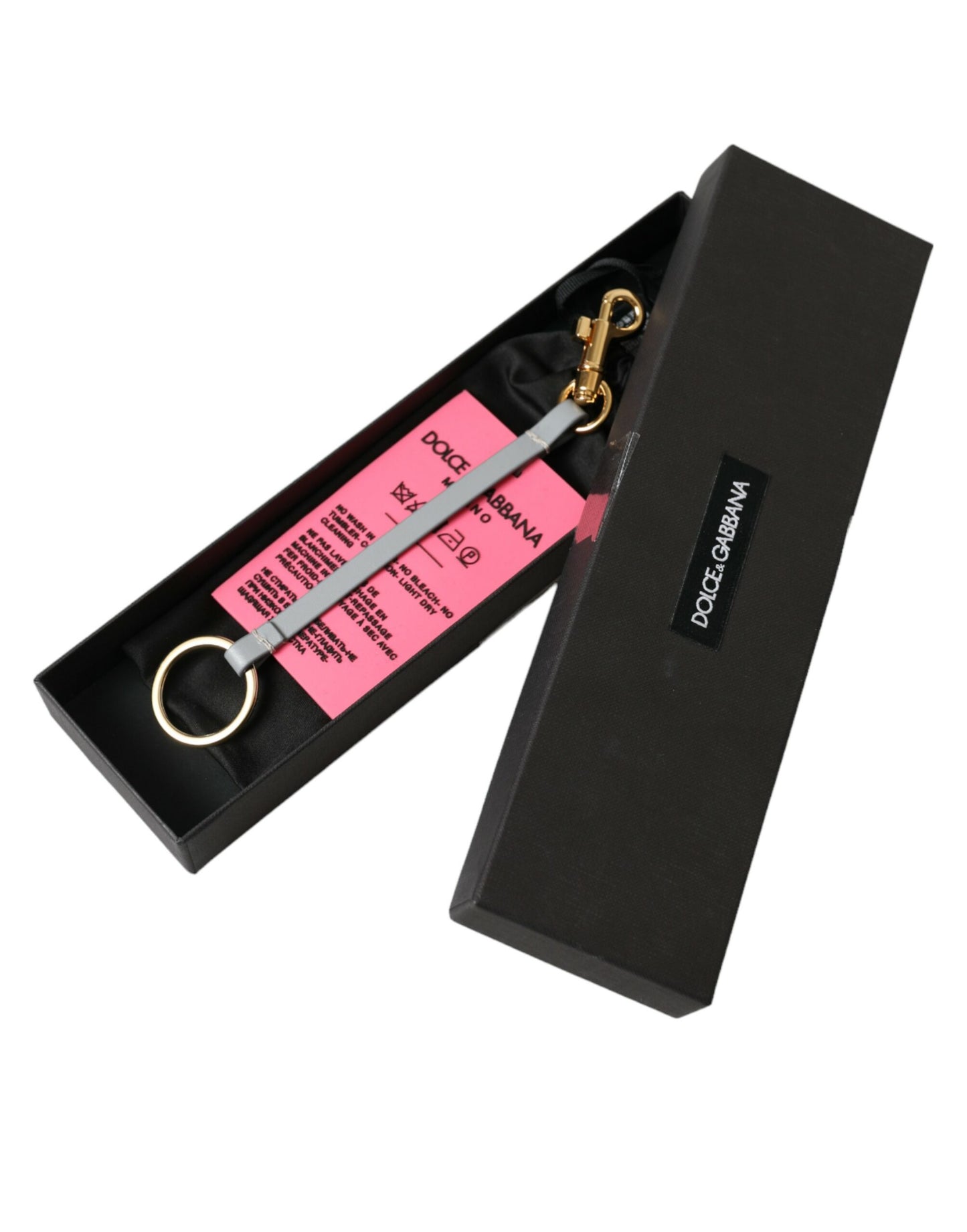 Portachiavi in ottone dorato con logo DG in silicone rosa Dolce & Gabbana