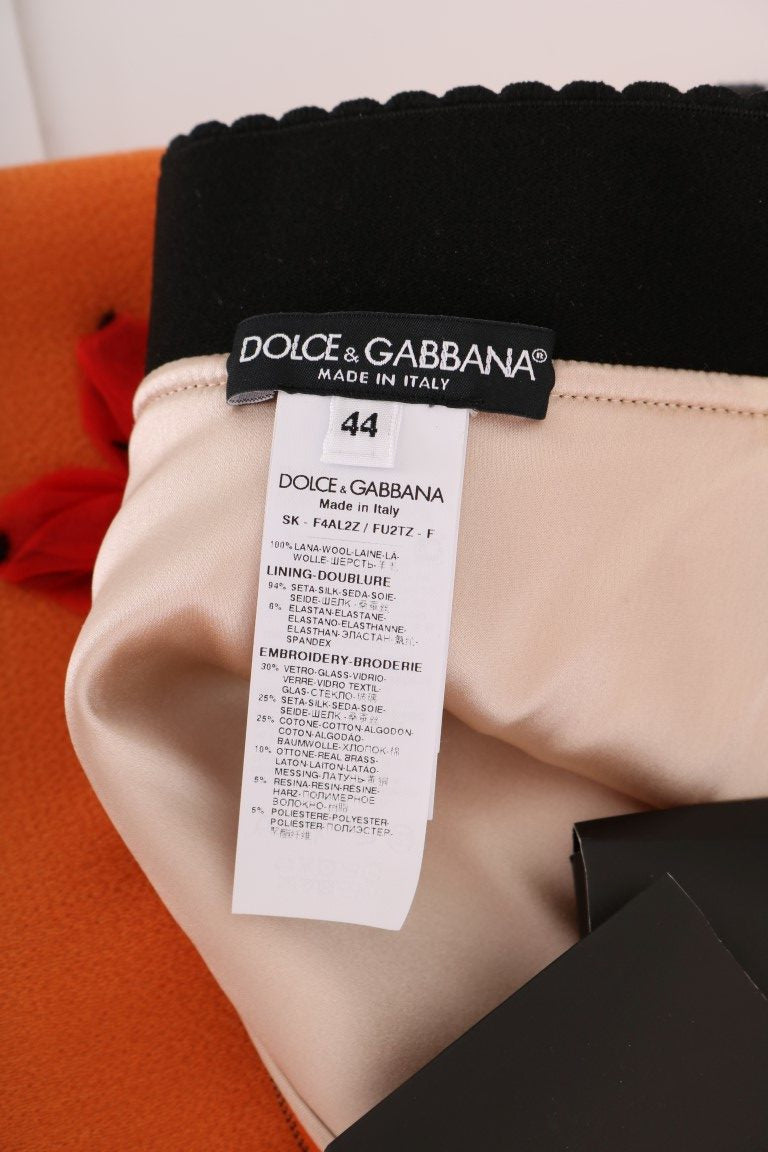 Gonna Dolce & Gabbana in lana arancione con applicazioni di paillettes e cristalli