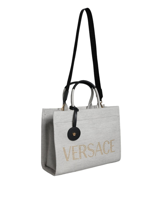 Borsa a tracolla con logo in pelle e tela con manico superiore Versace bianca