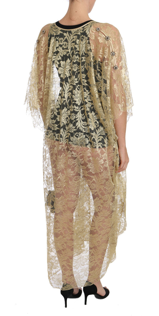 Abito con mantella in pizzo floreale dorato e cristalli di Dolce & Gabbana