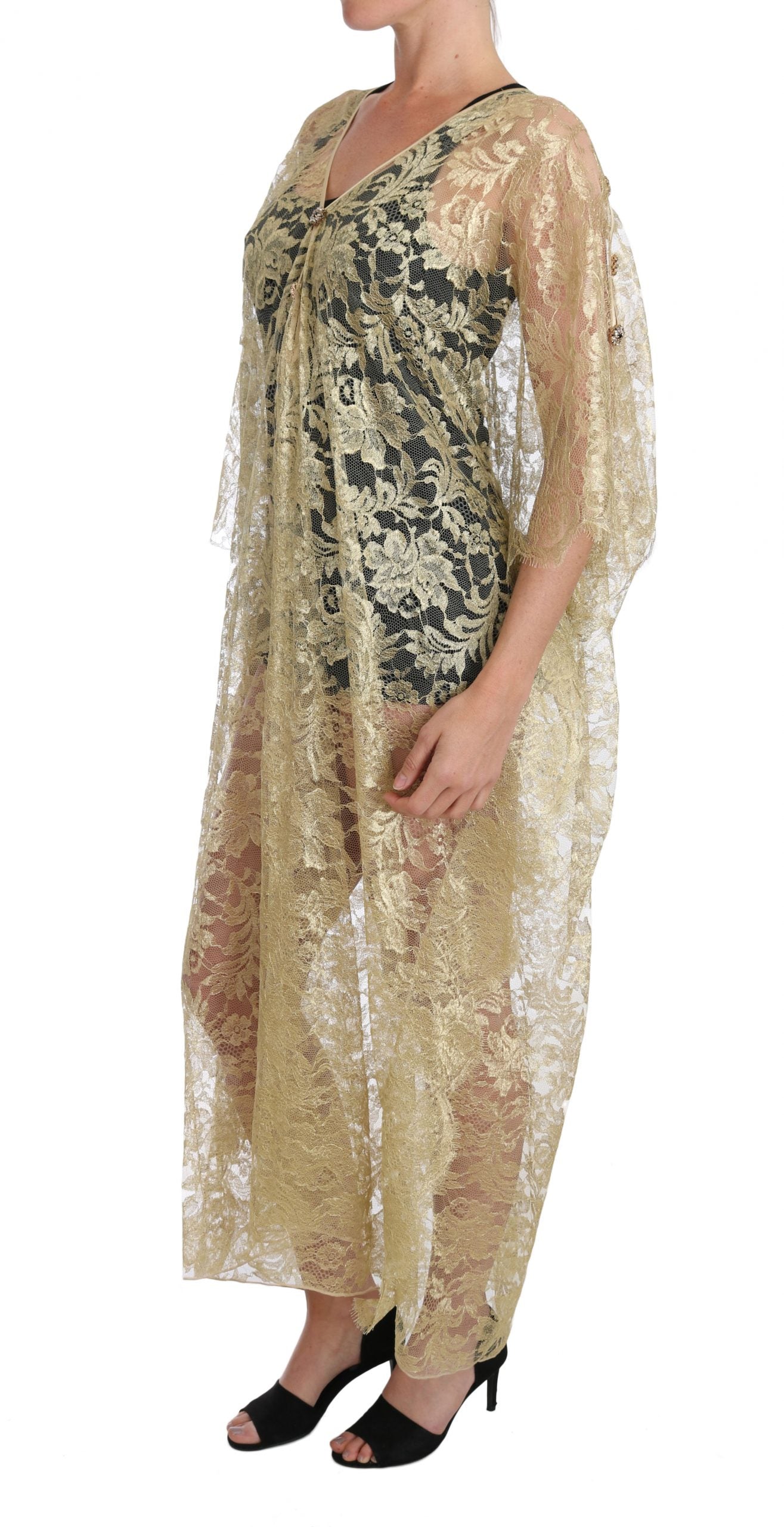 Abito con mantella in pizzo floreale dorato e cristalli di Dolce & Gabbana