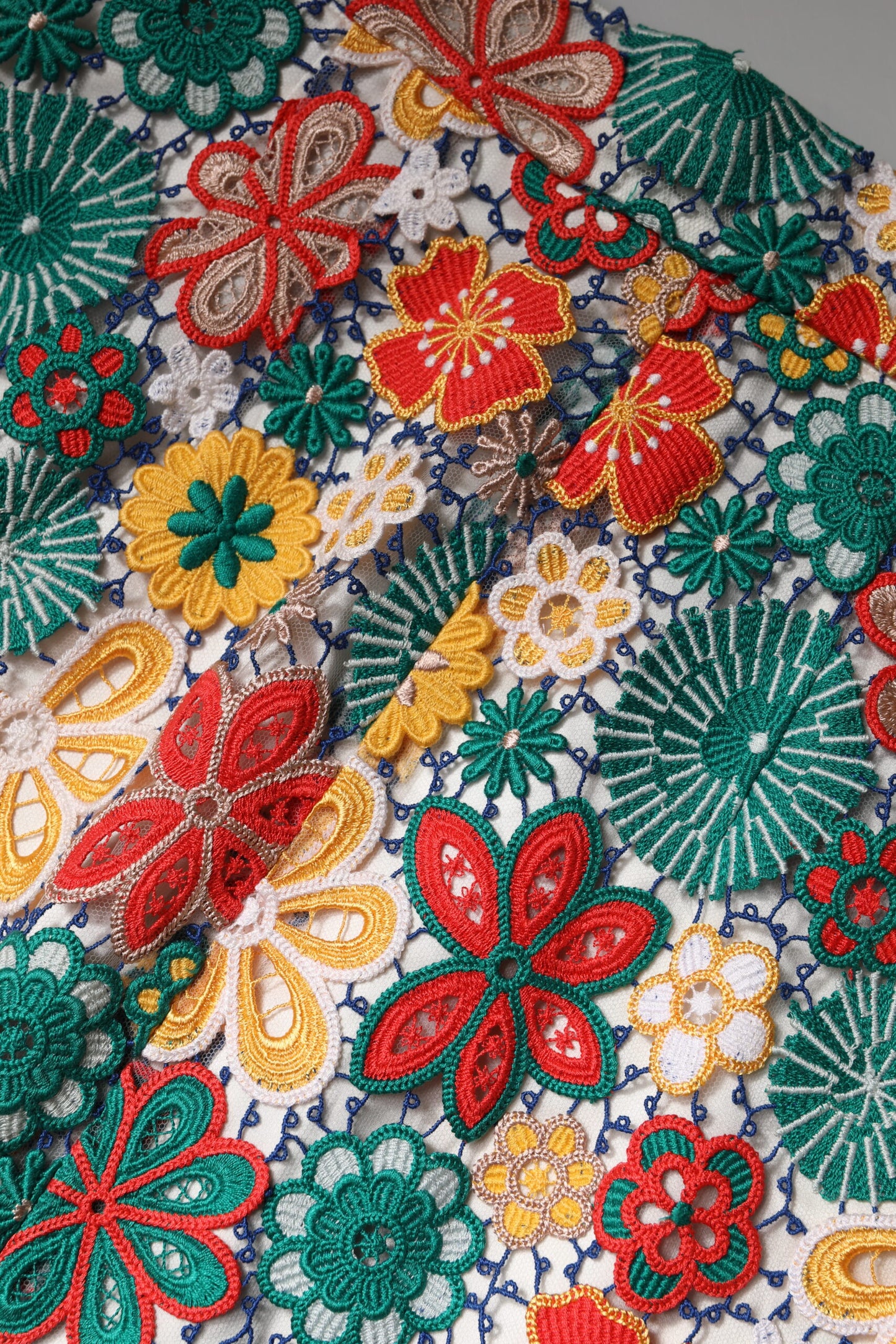 Minigonna a vita alta in pizzo floreale multicolore Dolce & Gabbana