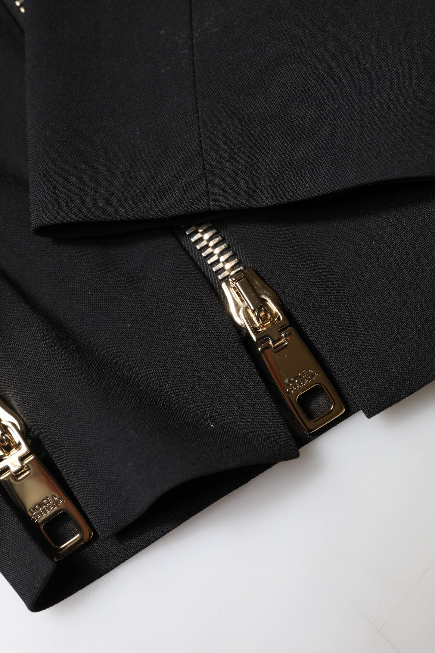 Pantaloni affusolati con cerniera a vita alta in lana nera Dolce & Gabbana