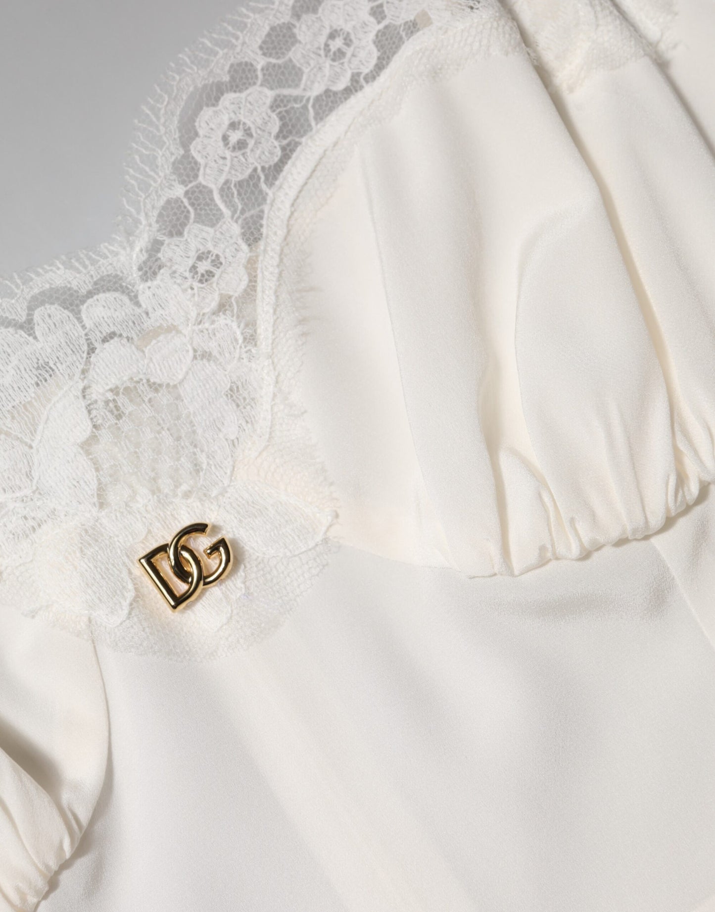 Dolce & Gabbana Abito da notte in seta con logo DG in pizzo bianco
