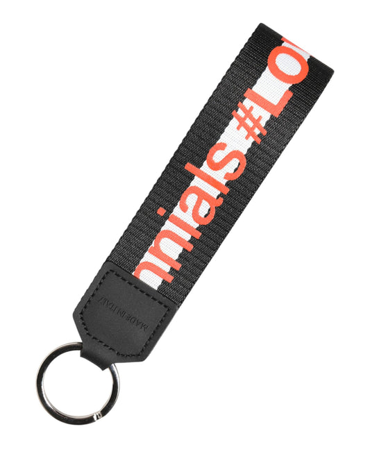 Portachiavi Dolce & Gabbana in ottone argentato con logo nero in poliestere
