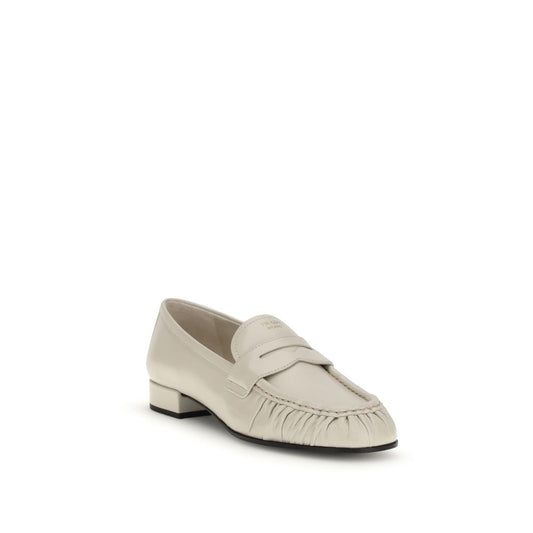 Mocassini slip-on Prada in pelle di vitello beige Bos Taurus