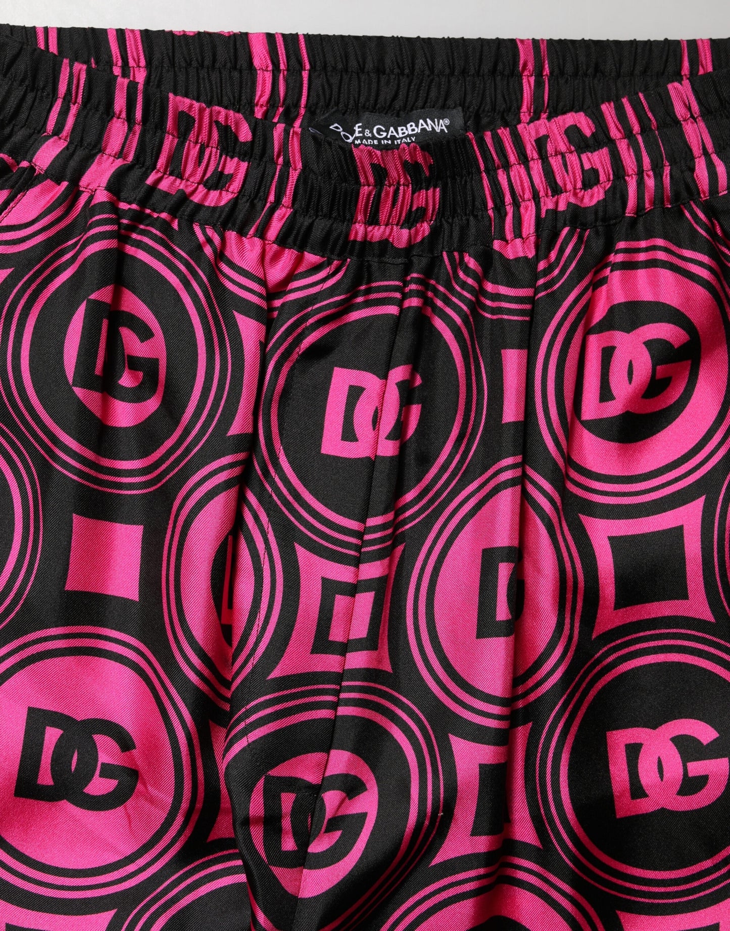 Dolce &amp; Gabbana Shorts in seta nera e fucsia con logo e vita elastica