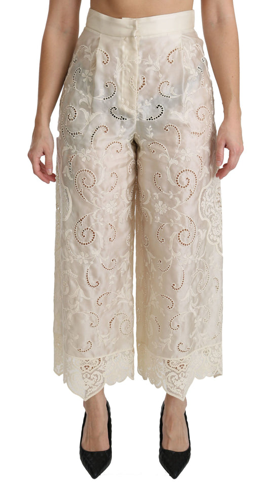 Pantaloni palazzo cropped a vita alta in pizzo color crema Dolce &amp; Gabbana