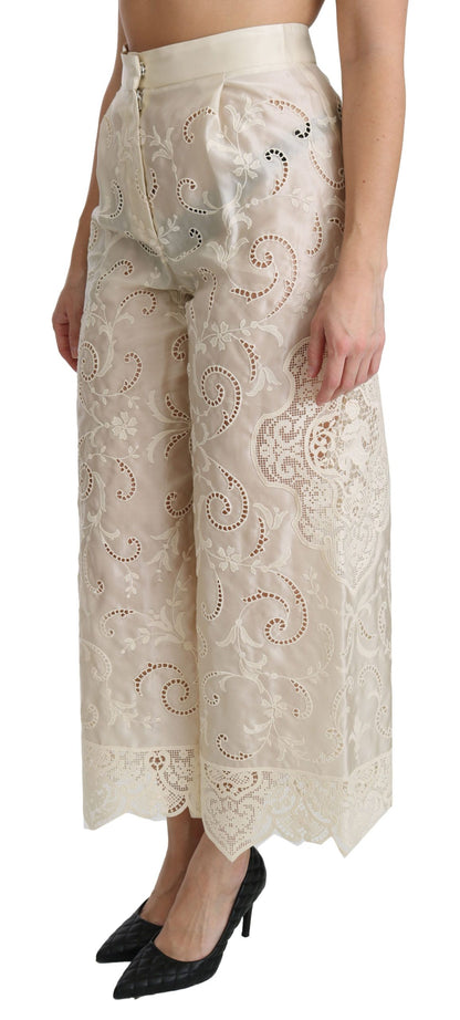 Pantaloni palazzo cropped a vita alta in pizzo color crema Dolce &amp; Gabbana