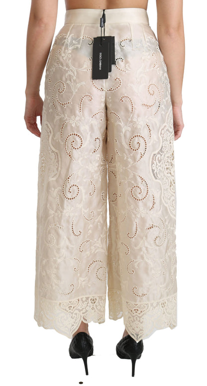 Pantaloni palazzo cropped a vita alta in pizzo color crema Dolce &amp; Gabbana