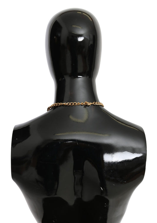 Collana con ciondolo a forma di fiore in cristallo e ottone dorato con foglie verdi di Dolce &amp; Gabbana