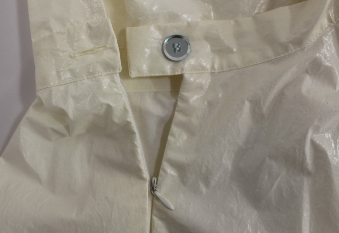 Abito da tè bianco con scollo all'americana e lunghezza al ginocchio di Licia Florio