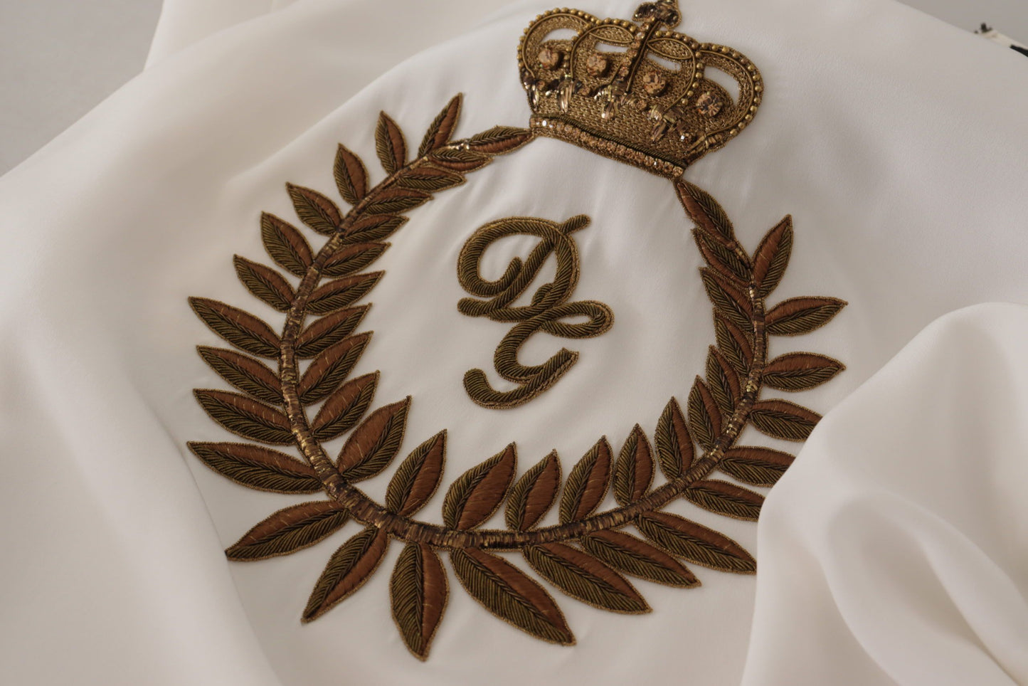 Dolce &amp; Gabbana Top in seta bianca con cristalli DG Crown dorati