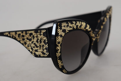 Occhiali da sole Dolce &amp; Gabbana DG4326 con lenti polarizzate a farfalla e paillettes nere e dorate