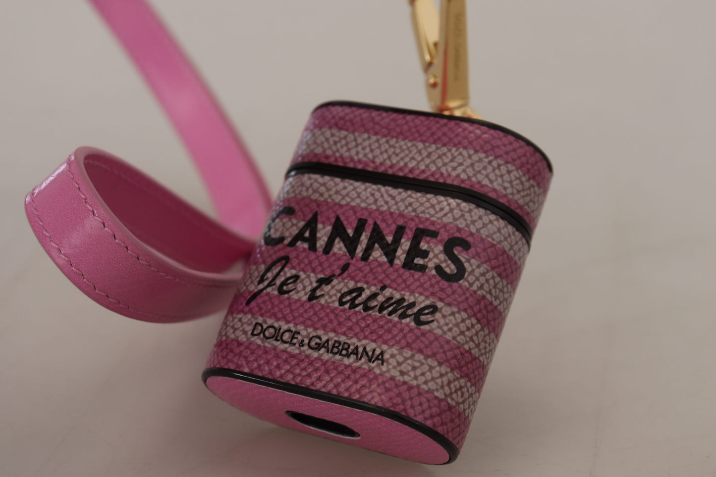 Custodia per Airpods Dolce &amp; Gabbana con cinturino in pelle rosa e nera e logo in metallo dorato