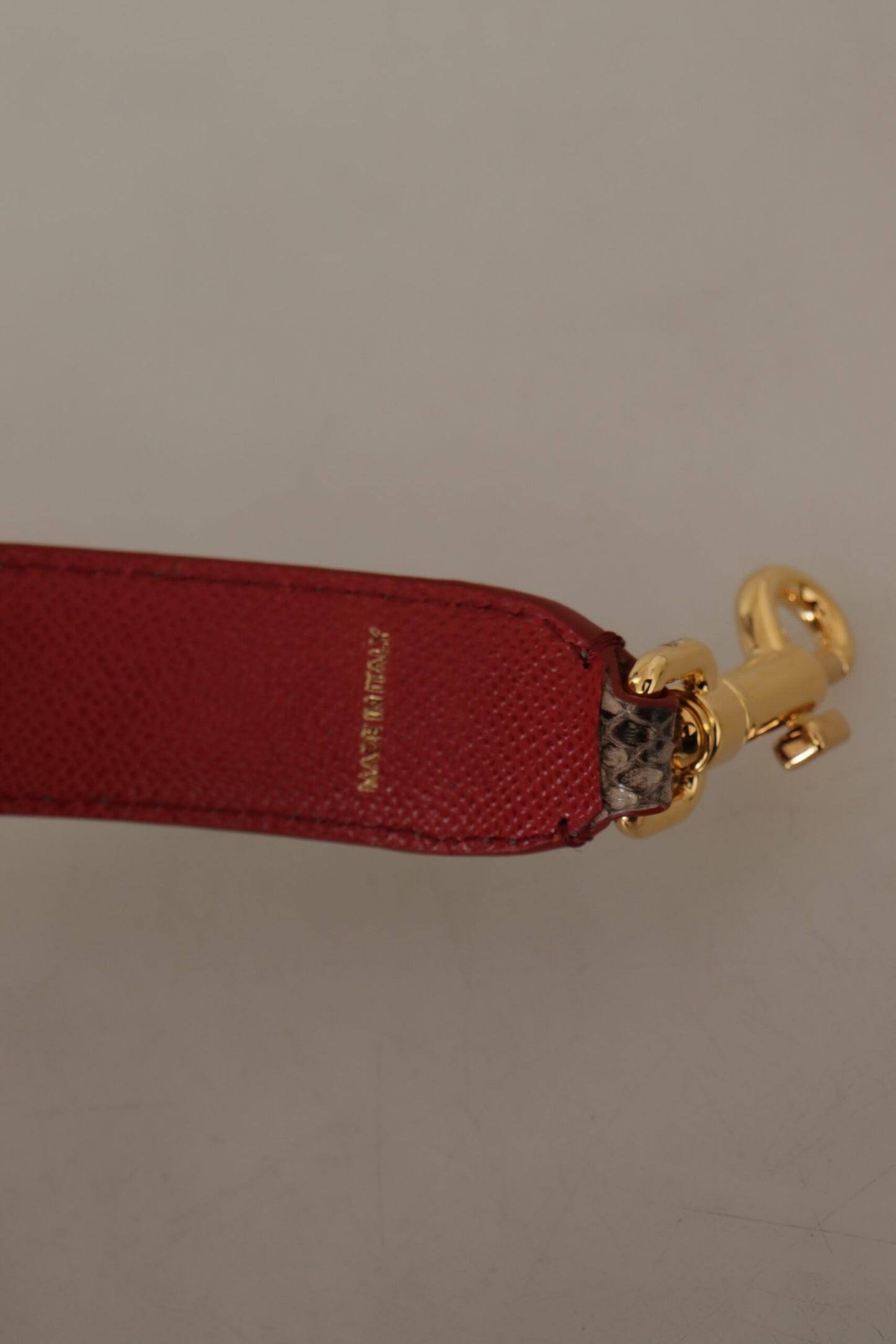 Tracolla borchiata in pelle di pitone marrone Dolce &amp; Gabbana
