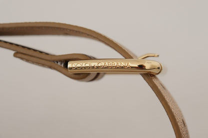 Cintura Dolce &amp; Gabbana in pelle color oro rosa con fibbia in metallo metallizzato