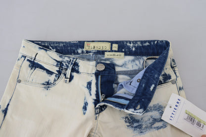 Jeans skinny in denim strappato da donna in cotone bianco e blu Acht