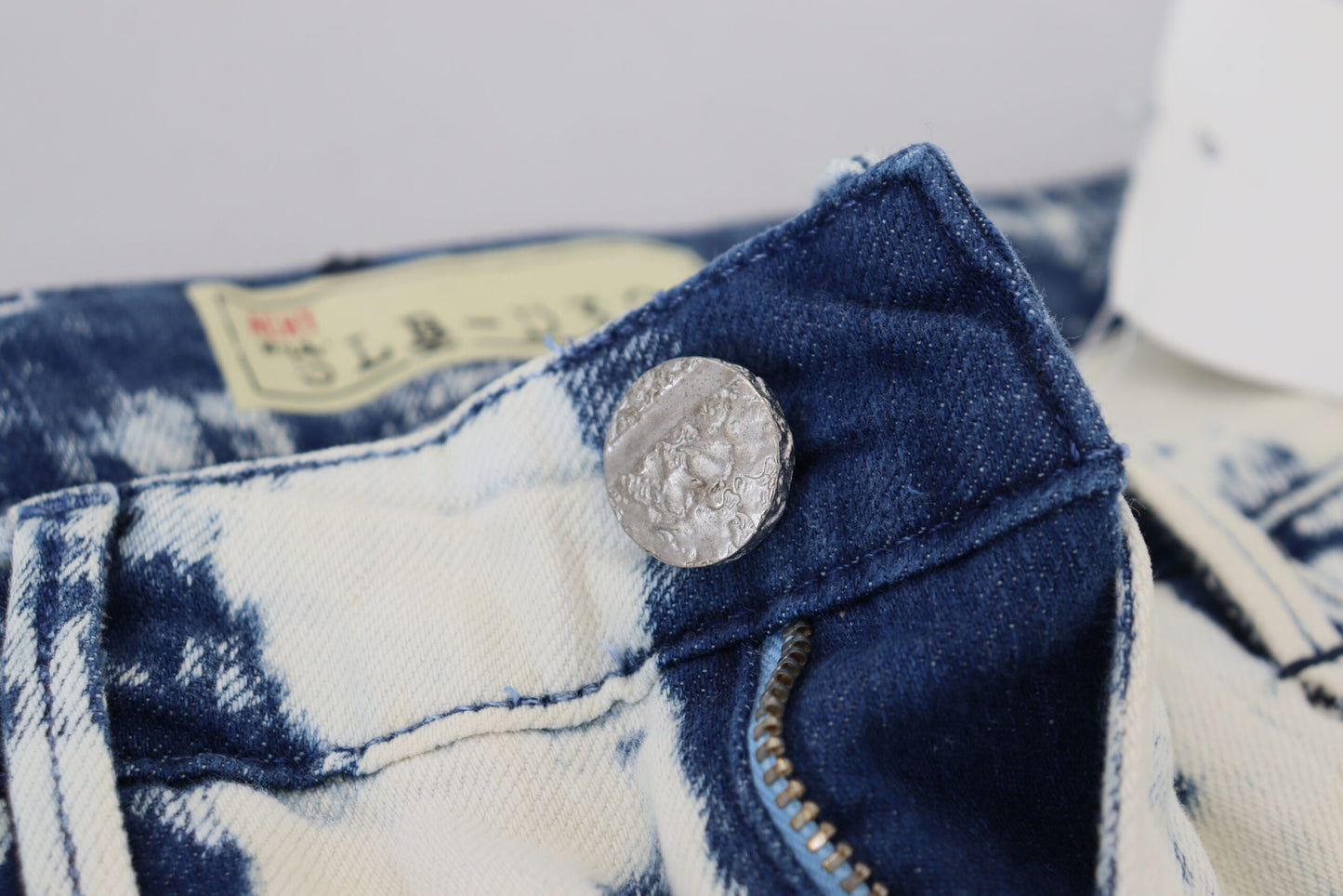 Jeans skinny in denim strappato da donna in cotone bianco e blu Acht