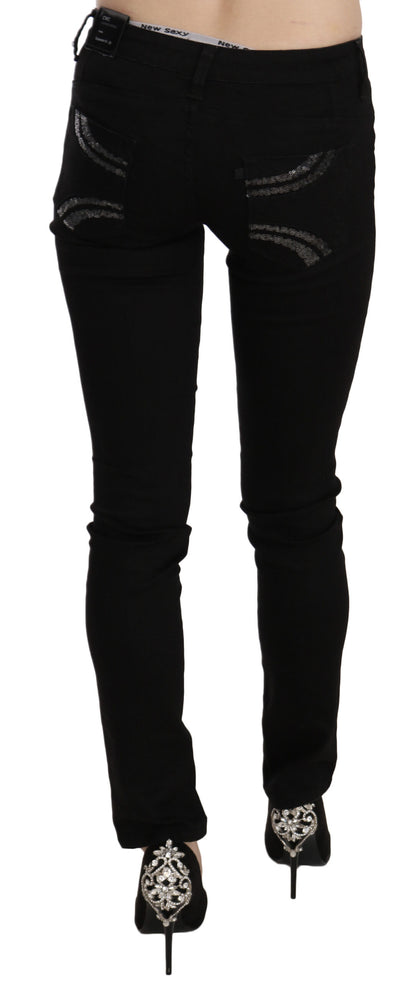 Jeans slim fit a vita media con paillettes nere di Costume National