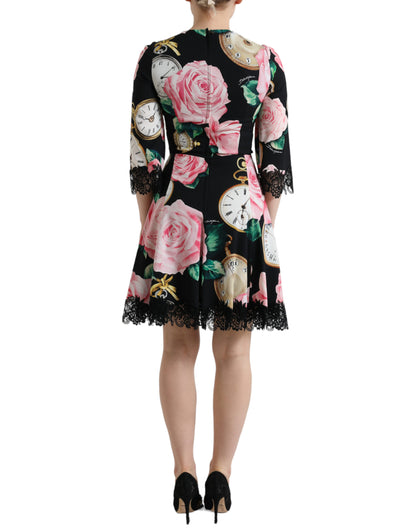 Abito a trapezio in pizzo nero con decorazioni floreali di Dolce &amp; Gabbana