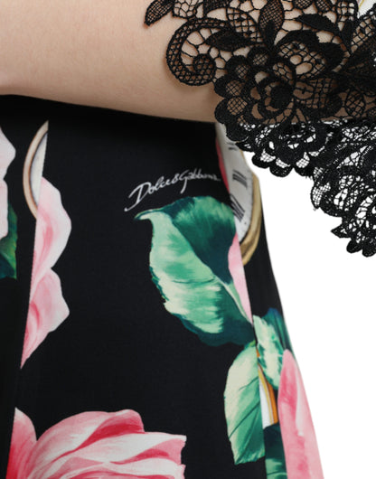 Abito a trapezio in pizzo nero con decorazioni floreali di Dolce &amp; Gabbana