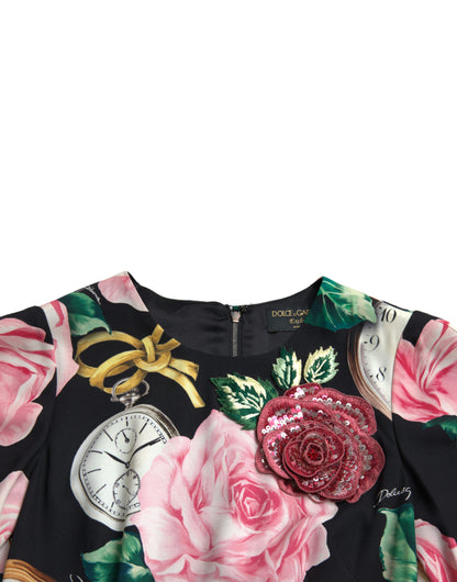 Abito a trapezio in pizzo nero con decorazioni floreali di Dolce &amp; Gabbana