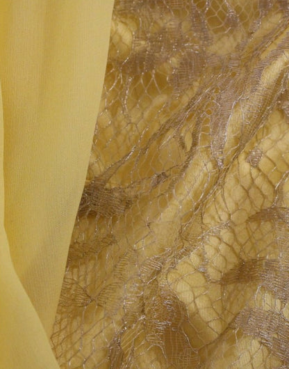 Mini abito in pizzo giallo con cristalli Dolce &amp; Gabbana