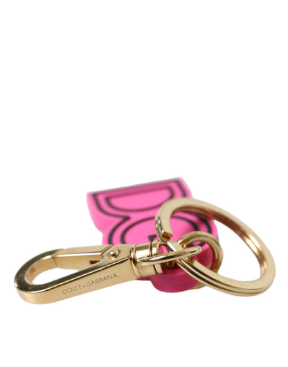 Portachiavi con logo DG in metallo dorato e gomma rosa Dolce &amp; Gabbana
