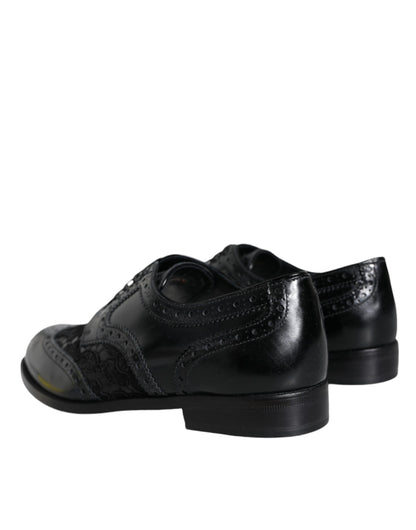 Scarpe eleganti in pelle nera con pizzo floreale Dolce &amp; Gabbana