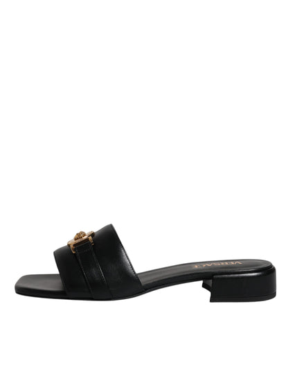 Scarpe basse slip-on con placca logo in pelle nera Versace