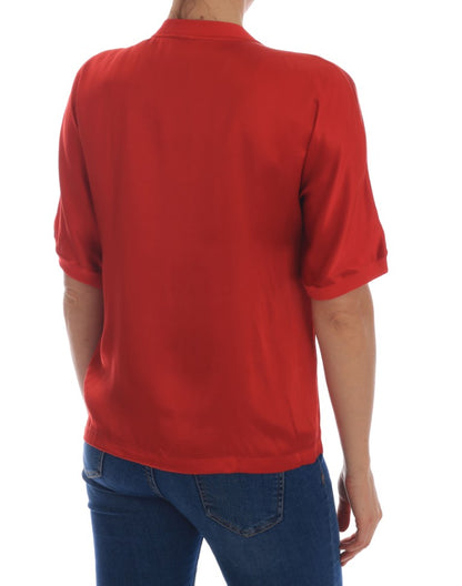 Blusa in seta rossa con cristalli floreali e arance di Dolce &amp; Gabbana