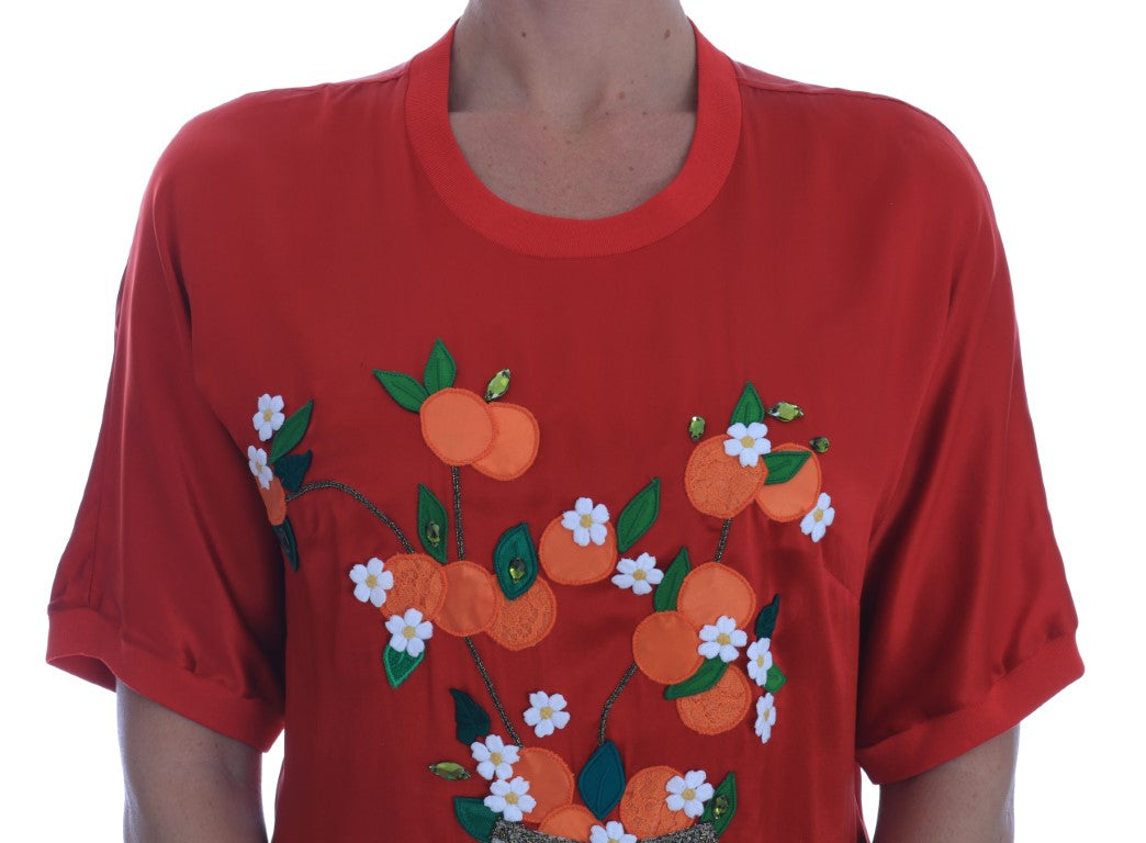 Blusa in seta rossa con cristalli floreali e arance di Dolce &amp; Gabbana