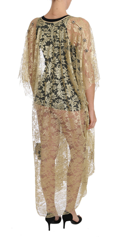 Abito con mantella in pizzo floreale dorato e cristalli di Dolce &amp; Gabbana