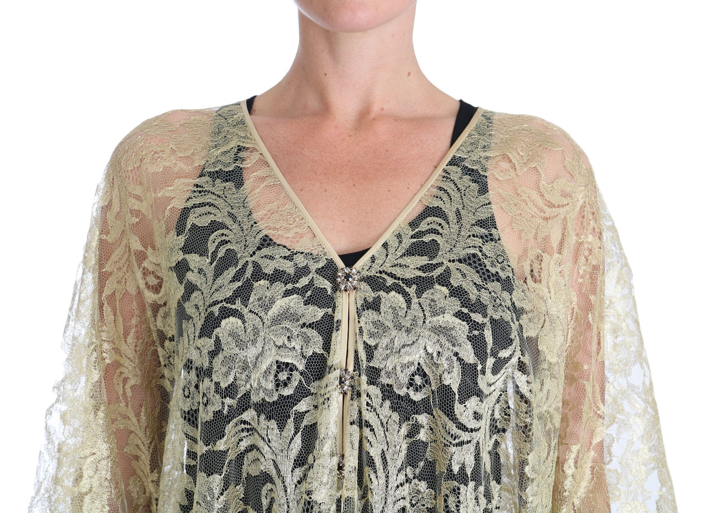 Abito con mantella in pizzo floreale dorato e cristalli di Dolce &amp; Gabbana