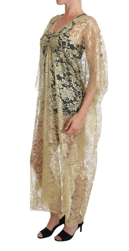 Abito con mantella in pizzo floreale dorato e cristalli di Dolce &amp; Gabbana