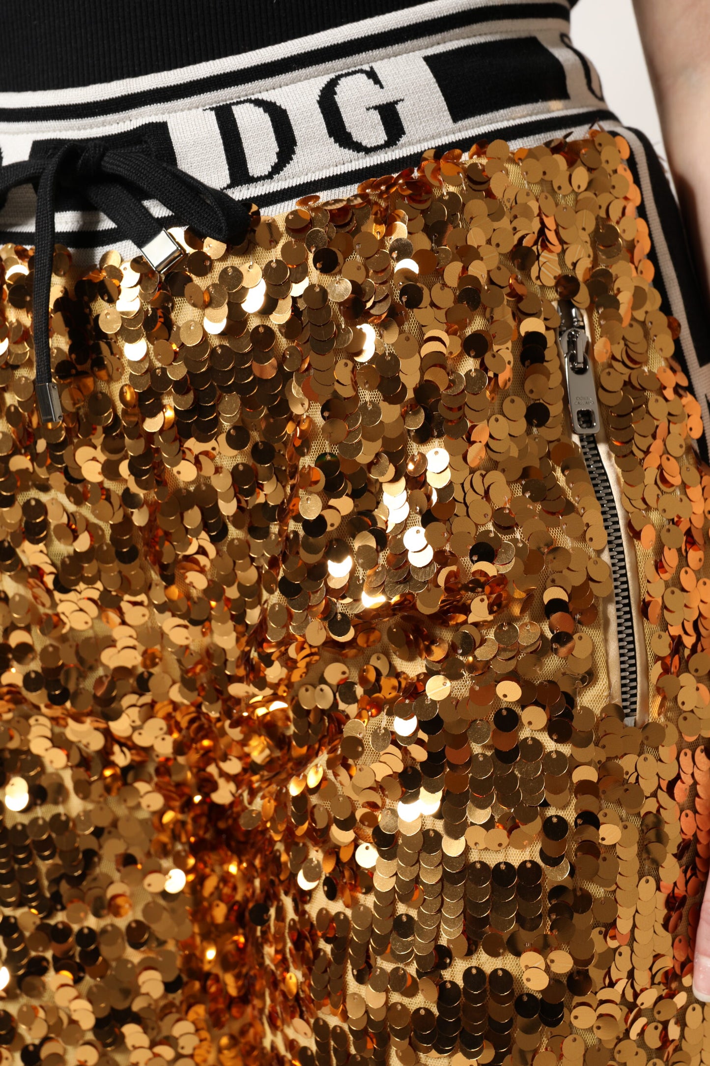 Pantaloni da jogging con paillettes e logo DG in oro metallizzato Dolce &amp; Gabbana