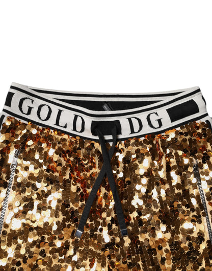Pantaloni da jogging con paillettes e logo DG in oro metallizzato Dolce &amp; Gabbana