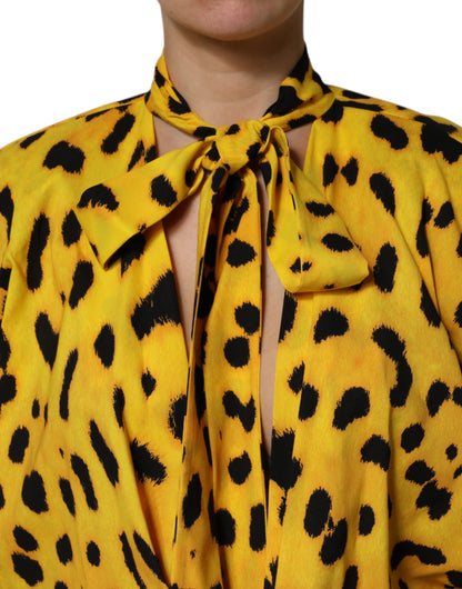 Abito tuta a maniche lunghe con stampa leopardata gialla Dolce &amp; Gabbana