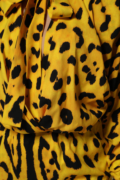 Abito tuta a maniche lunghe con stampa leopardata gialla Dolce &amp; Gabbana