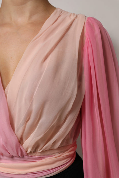 Dolce &amp; Gabbana Top blusa rosa con scollo a V profondo e maniche lunghe