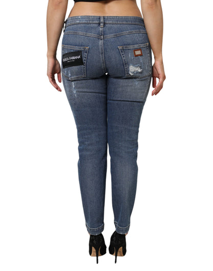 Jeans in denim a vita bassa in cotone blu strappato Dolce &amp; Gabbana
