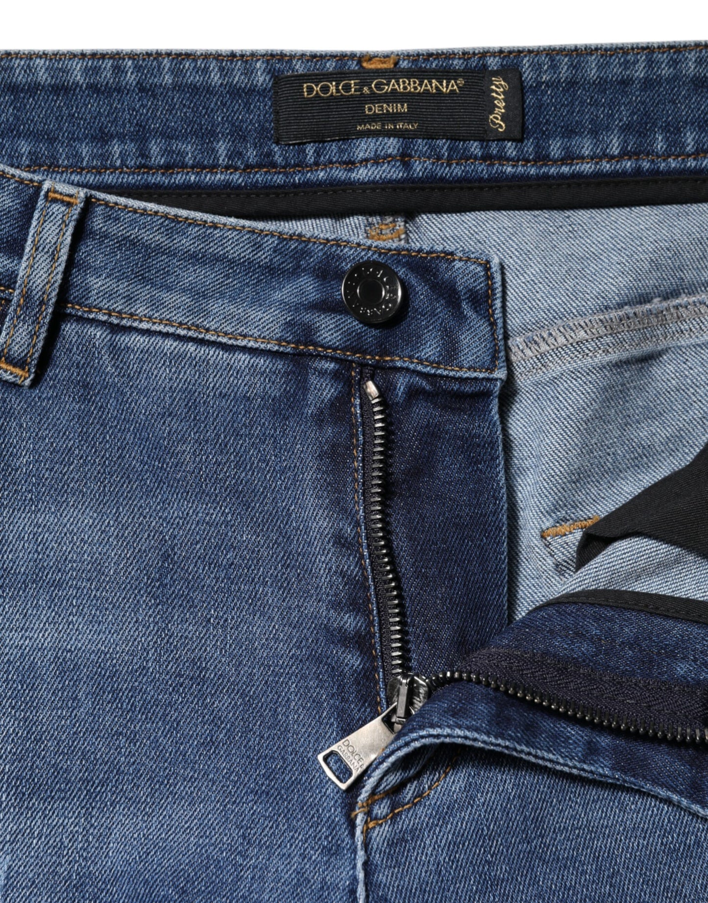 Jeans in denim a vita bassa in cotone blu strappato Dolce &amp; Gabbana