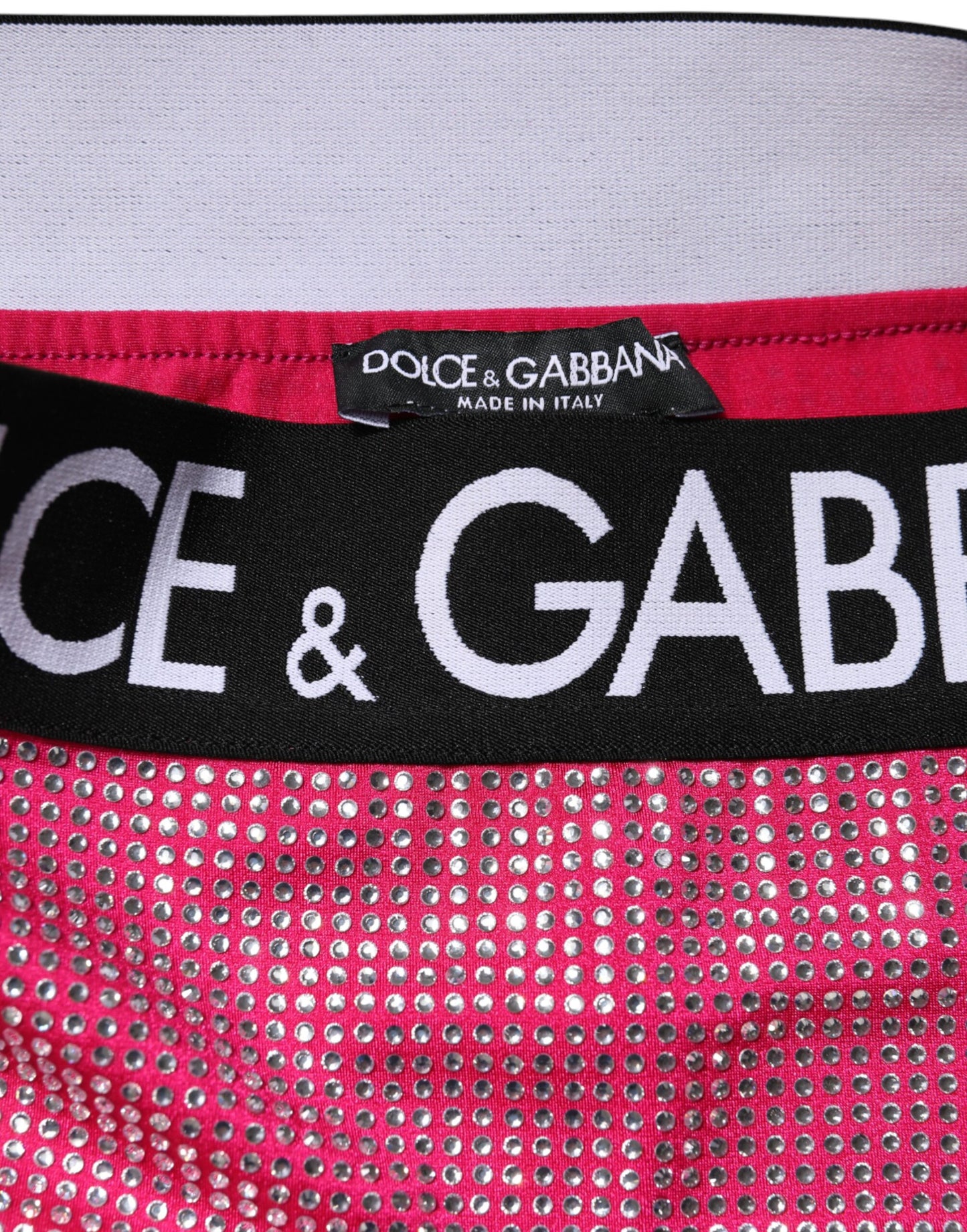 Minigonna con logo decorato con strass rosa Dolce &amp; Gabbana