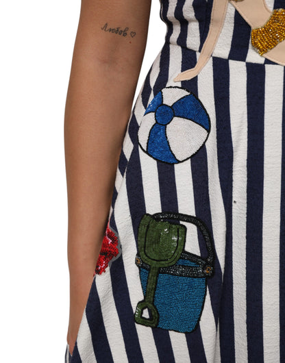 Abito a trapezio ricamato a righe bianche e blu di Dolce &amp; Gabbana
